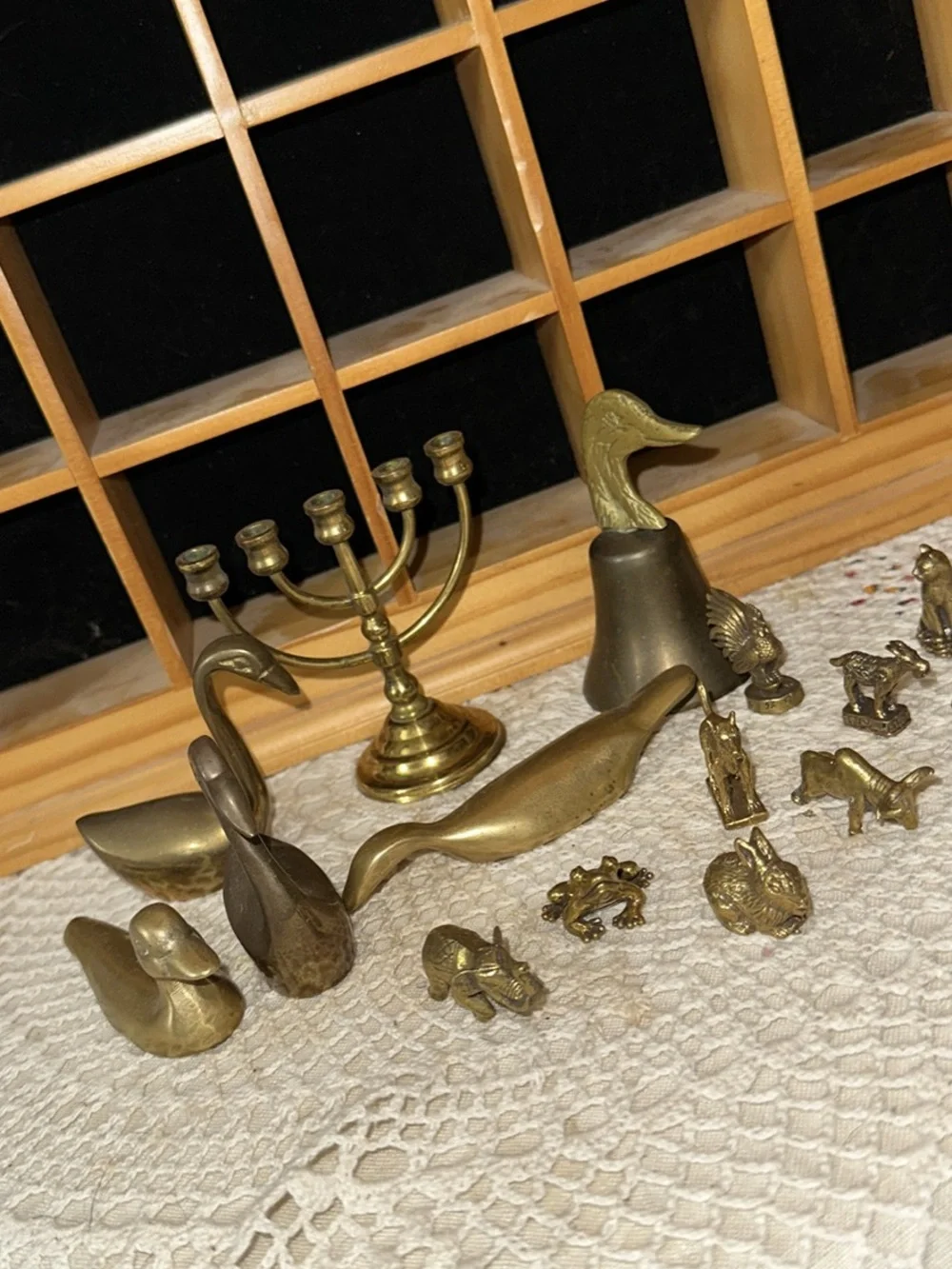 Wooden Grid Display Shelf Wall Decor in Natural Pine &brass figurines
